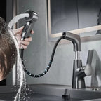 Mitigeur de lavabo avec douchette extractible et bec pivotant